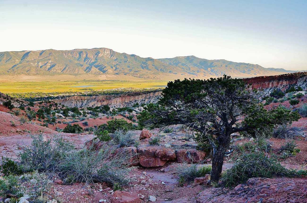 The Sevier Valley at sunset with mountains along the skyline
